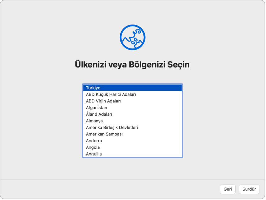 Ayarlama Yardımcısı’nda bir ekran, kullanıcı ülkesi veya bölgesini seçme seçeneklerini gösteriyor.