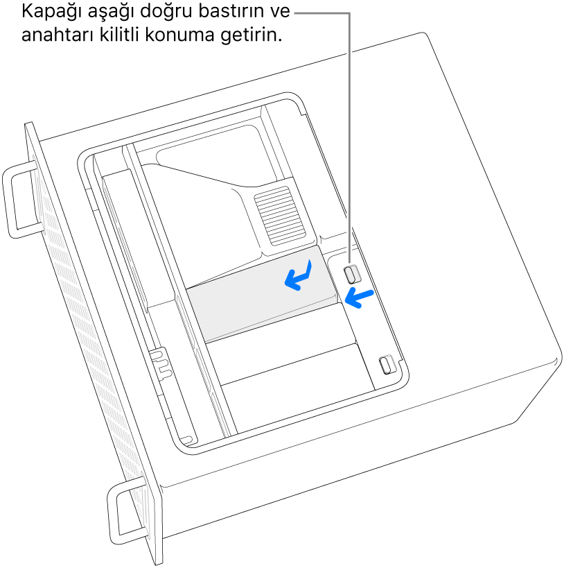 Kilit anahtarını sola hareket ettirip SSD kapağına bastırarak SSD kapakları yeniden takılıyor.