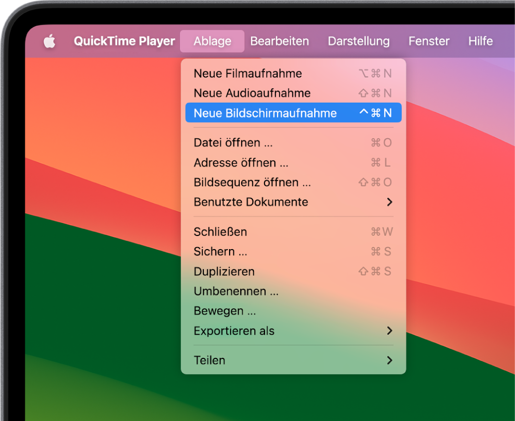 In der App „QuickTime Player“ ist das Menü „Ablage“ geöffnet und der Befehl „Neue Bildschirmaufnahme“ ist ausgewählt, um die Aufnahme des Bildschirms zu starten.