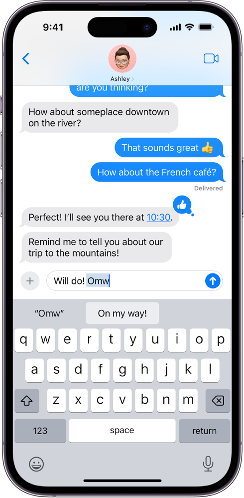 A message with the text shortcut “Omw” typed and the phrase “On my way!” suggested below as replacement text.