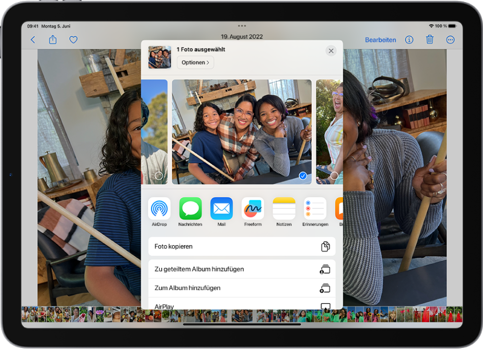 Ein geöffnetes Foto in der App „Fotos“ mit Optionen zum Teilen, die in der Mitte des Bildschirms angezeigt werden.