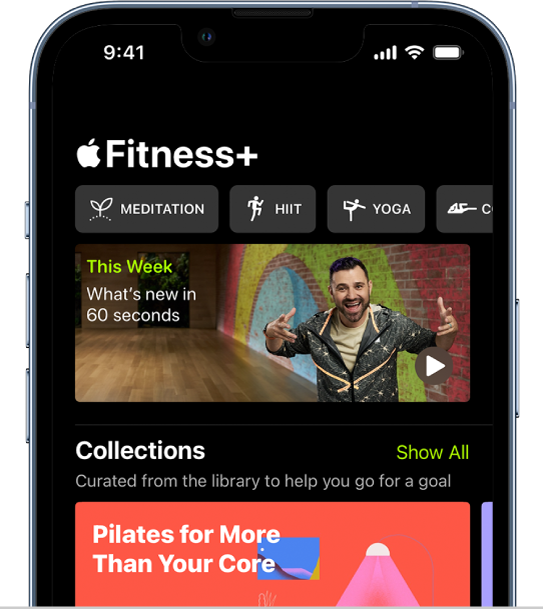 Екранът на Apple Fitness+, показващ, от ляво надясно, различни видове тренировки в най-горния ред. Зоната Тази седмица възпроизвежда 60-секундно видео с тренировки, треньори и програми за трениране, които са нови за Apple Fitness+.