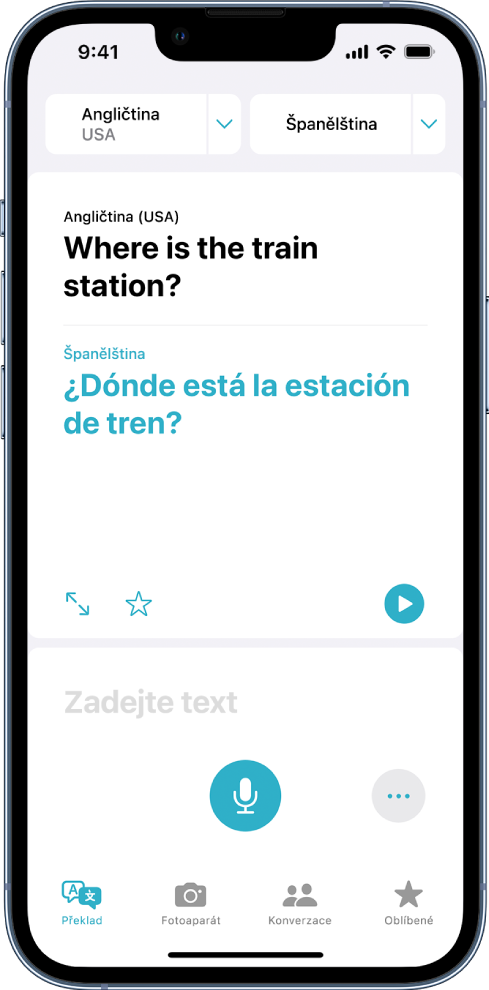 Panel Překlad se dvěma voliči jazyků u horního okraje, na kterých je vybraná angličtina a španělština, s přeloženým textem uprostřed a polem pro zadávání textu v dolní části.