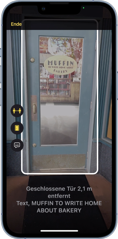 Der Bildschirm „Lupe“ im Erkennungsmodus zeigt eine Tür mit einem Zeichen im Fenster. Unten befindet sich eine Liste der Türattribute für die erkannte Tür.