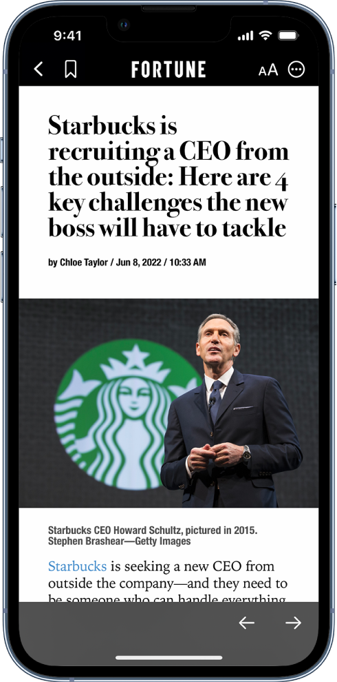An article from Apple News. At the top-left corner of the screen is the Back button to return to the Stocks app and the Bookmark button. At the top-right corner are the Text Size and More Actions buttons. At the bottom-right corner are the Previous and Next buttons.