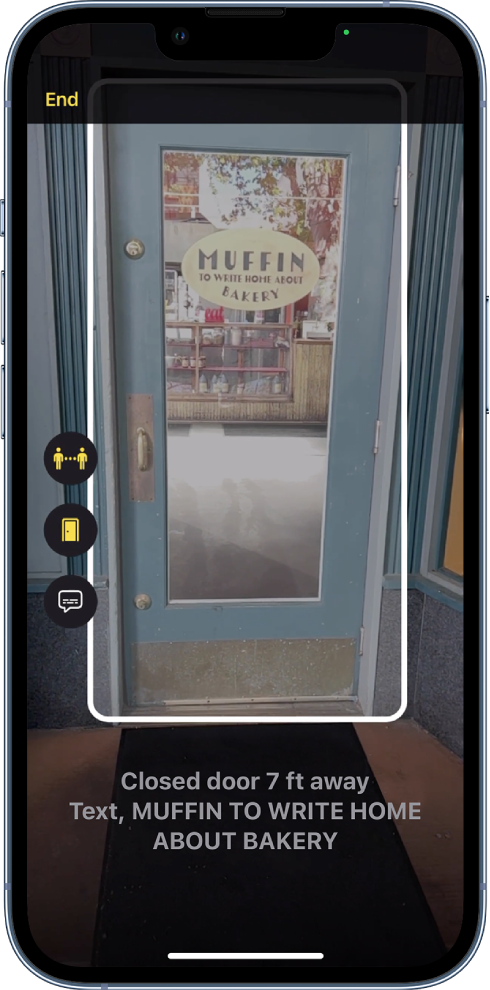 The Magnifier screen in Detection Mode showing a door with a sign in the window. At the bottom is a list of door attributes for the detected door.
