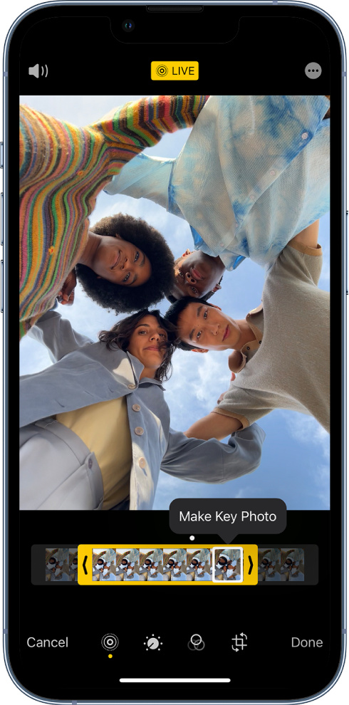 A Live Photo screen with the Live Photo in the center. The Live button is in the top middle, and the Sound button in the top left. Beneath the photo is the frame viewer with the Make Key Photo button active. On either end of the frame viewer are two arrows that allow you to trim the Live Photo.
