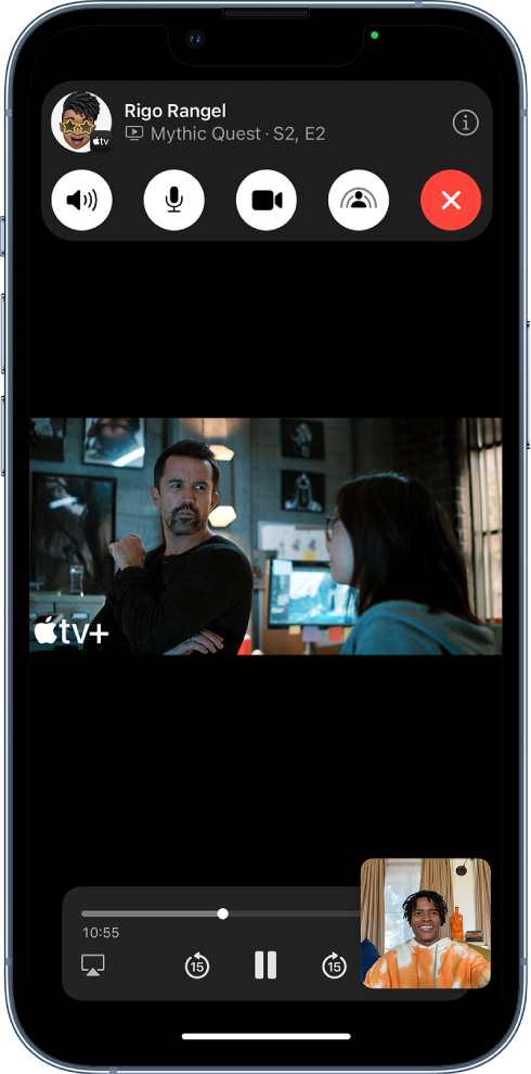 A FaceTime call, showing Apple TV+ video content being shared in the call. The FaceTime controls are shown at the top of the screen, the video is playing just below the controls, and the playback controls are at the bottom of the screen.