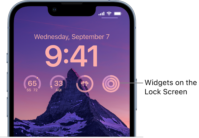 A custom Lock Screen showing a photo of Half Dome in the background, with widgets on top of the photo for the temperature, air quality index, AirPods battery level, and fitness rings.