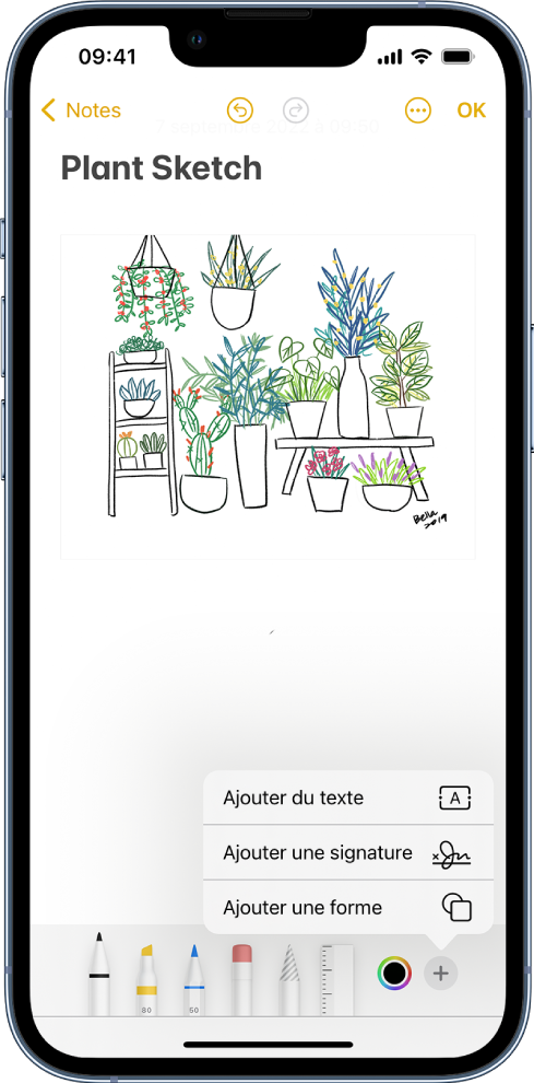 Un diagramme d’une rénovation de cuisine est annoté dans l’app Notes. La barre d’outils d’annotation avec les outils de dessins et le sélecteur de couleurs apparaît en bas de l’écran. Un menu avec des options pour ajouter du texte, une description, une signature, une loupe et des formes apparaît dans le coin inférieur droit.