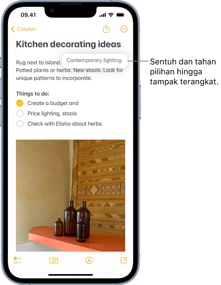 Di catatan di app Catatan, frasa yang dipilih muncul sebagai hasil dari tindakan sentuh dan tahan yang dilakukan pengguna.