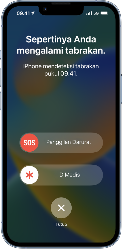 Layar iPhone menampilkan bahwa tabrakan telah terdeteksi, di bawahnya terdapat tombol Panggilan Darurat, ID Medis, dan Tutup.