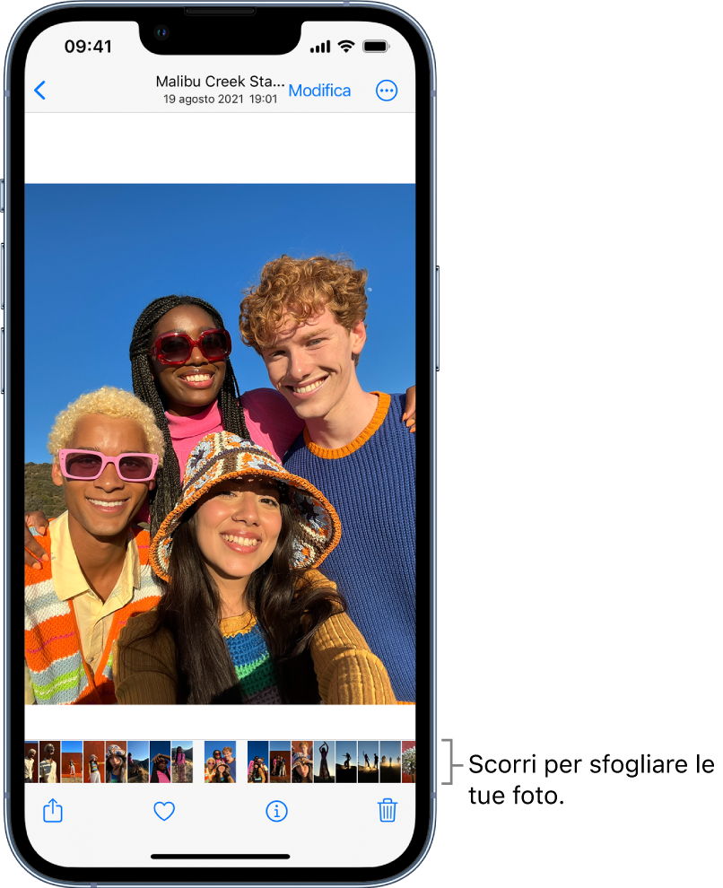Una foto con miniature di altre foto nella parte inferiore dello schermo. In alto a sinistra è presente un pulsante Indietro, che ti riporta al pannello in cui stavi sfogliando i file. Lungo la parte inferiore dello schermo sono presenti i pulsanti Condividi, “Mi piace” ed Elimina. In alto a destra è presente il pulsante Modifica.