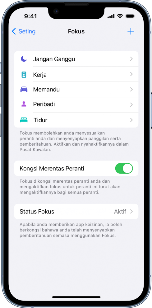 Skrin menunjukkan lima pilihan Fokus yang disediakan—Jangan Ganggu, Memandu, Peribadi, Tidur dan Bekerja. Butang Kongsi Merentas Peranti membolehkan anda menggunakan seting Fokus yang sama pada semua peranti Apple yang anda daftar masuk dengan Apple ID yang sama.