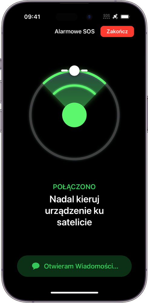 Ekran funkcji Alarmowe SOS (łącze satelitarne) ze wskazówkami pokazującymi, jaki skierować iPhone’a w stronę satelity. Na dole widoczne jest powiadomienie „Otwieram Wiadomości“.