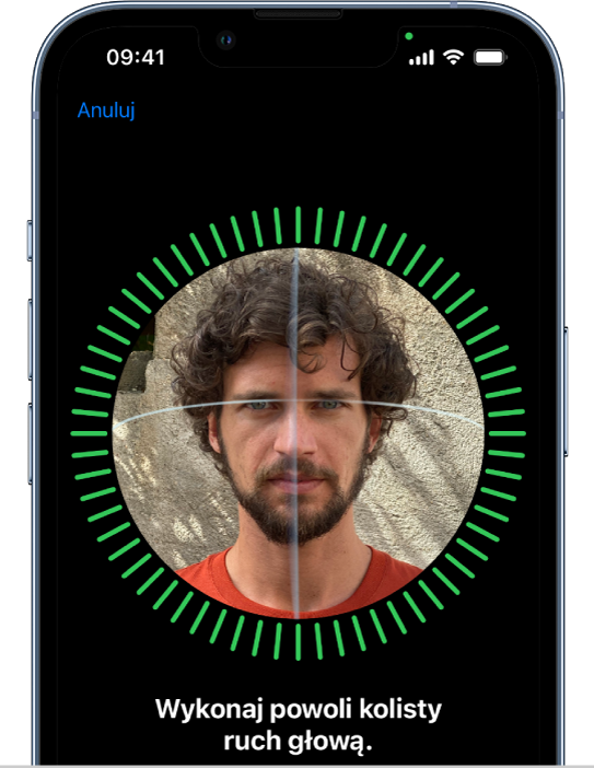 Ekran konfiguracji funkcji Face ID. Na ekranie widoczna jest twarz otoczona okręgiem. Tekst na dole prosi użytkownika, aby wykonał powoli kolisty ruch głową.