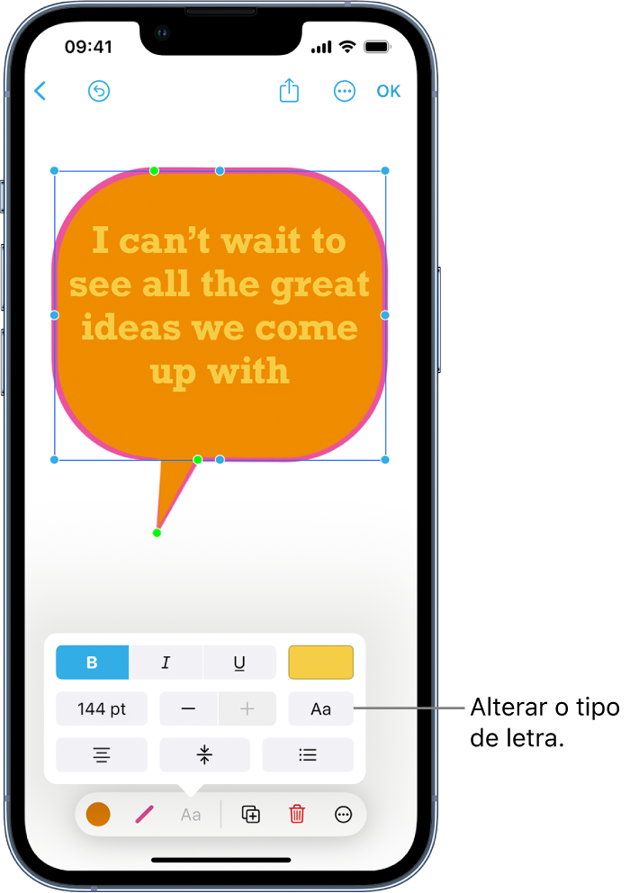 Uma forma de balão de fala selecionada, com as ferramentas de formatação e pontos verdes e azuis visíveis. Aparece um menu pop-up com as opções de formatação de texto por cima das ferramentas de formatação.