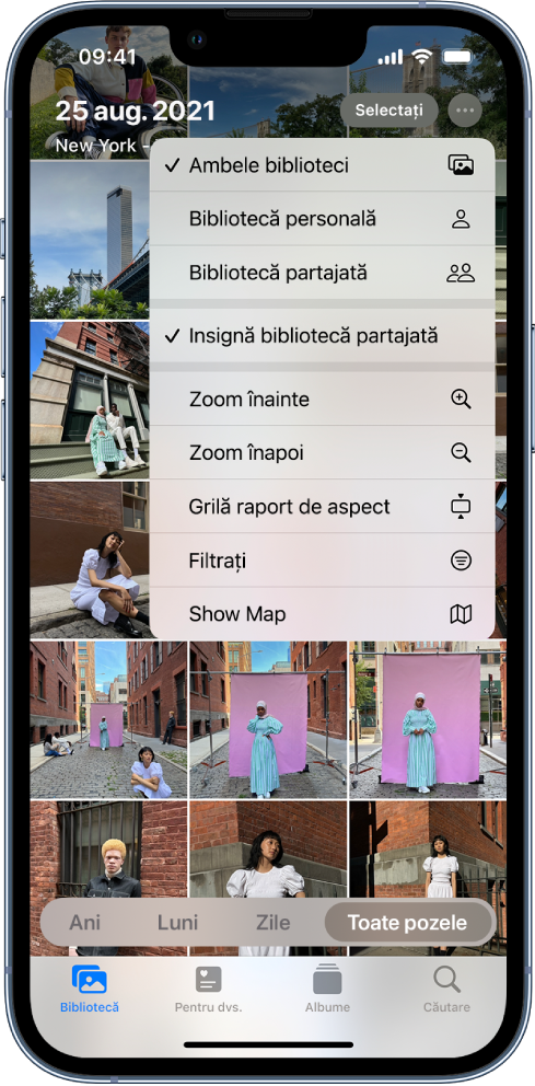 O bibliotecă foto în aplicația Poze. Este selectat butonul Mai multe în dreapta sus, iar articolele Ambele biblioteci și Insignă bibliotecă partajată sunt selectate în meniu.