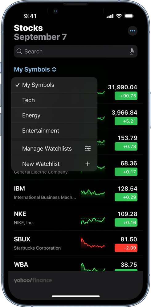 Seznam za spremljanje, na katerem so prikazane različne delnice. Za vsako delnico na seznamu so od leve proti desni prikazani simbol in ime delnice, grafikon vrednosti delnice, cena delnice in sprememba cene. Na vrhu zaslona je izbran seznam za spremljanje My Symbols in na voljo so naslednji seznami za spremljanje in možnosti: Tech, Energy, Entertainment, Manage Watchlists in New Watchlist.