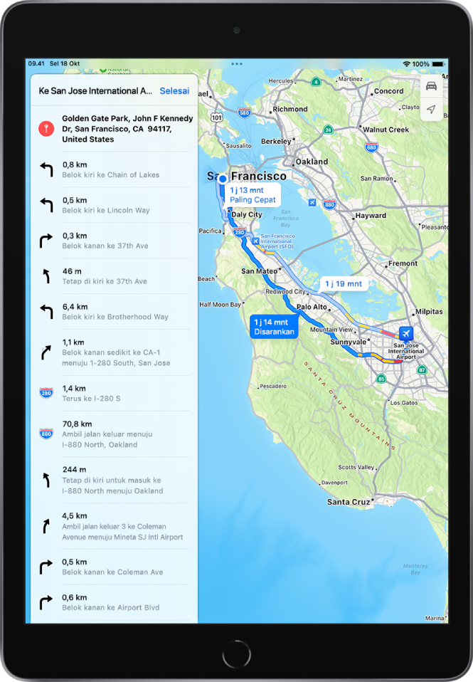 Petunjuk arah belokan demi belokan dan peta menampilkan dua rute berkendara dari Golden Gate Park ke Bandara Internasional San Jose. Rute yang disarankan dipilih.