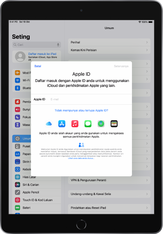 Skrin Seting, dengan dialog daftar masuk Apple ID di bahagian tengah skrin.