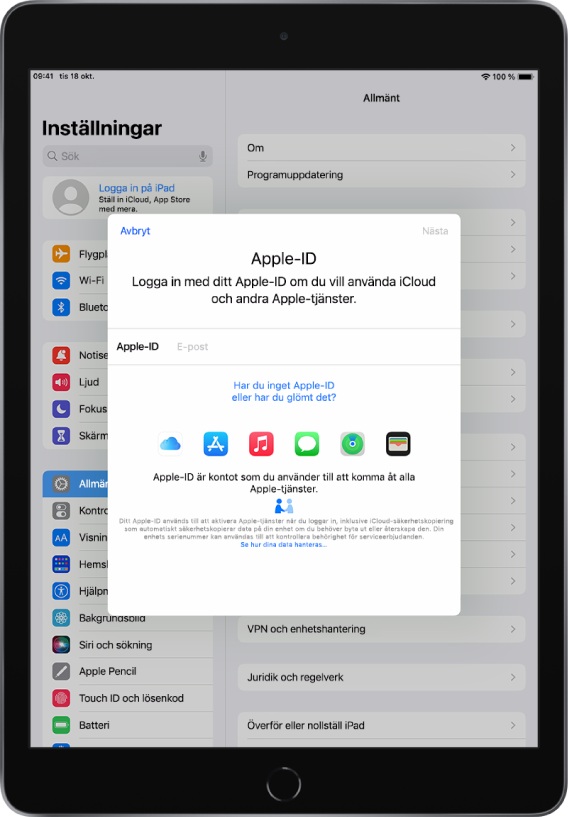 Skärmen Inställningar med inloggningsdialogen för Apple-ID i mitten av skärmen.