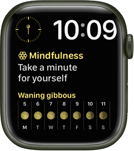 The Modular Duo watch face showing a digital clock near the top right, and three complications: Compass at the top left, Mindfulness in the middle, and Moon Phase at the bottom.