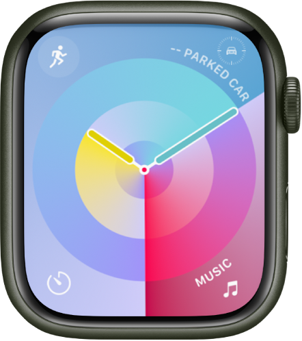 Palette watch face showing an analog clock in the middle and four complications: Workout at the top left, Parked Car Waypoint at the top right, Timer at the bottom left, and Music at the bottom right.