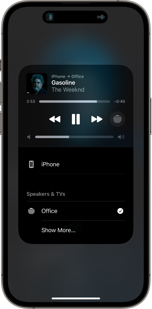 On an iPhone screen, a song is playing and a list of devices and speakers is showing. iPhone is selected, and HomePod is an option below.