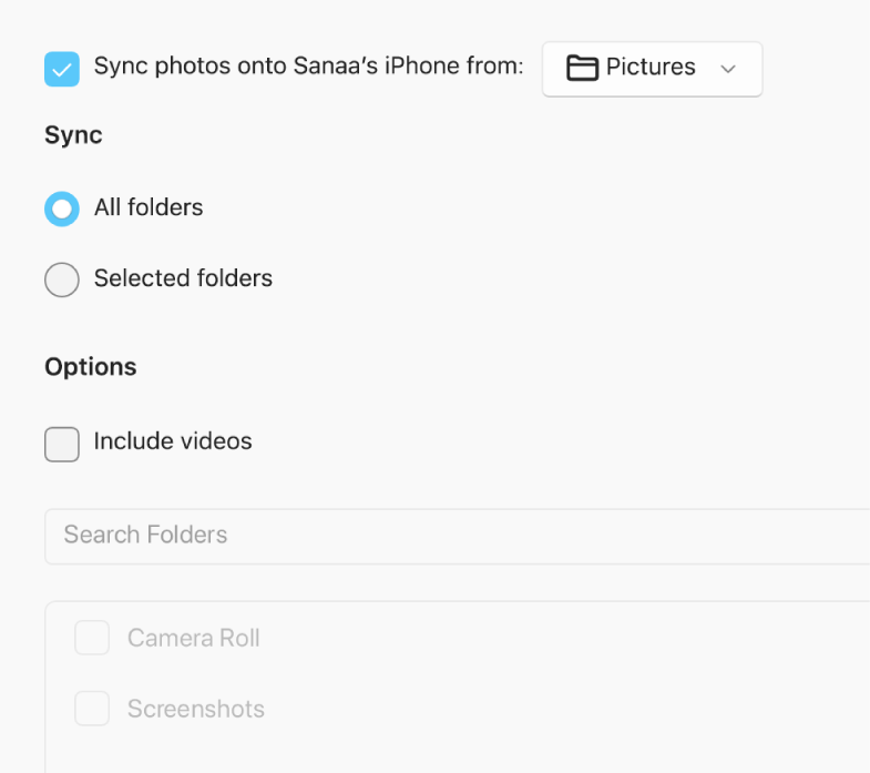 “All photos and albums” and Selected albums radio buttons appear with “Only favourites”, “Include videos” and “Automatically include photos from” tick boxes below.