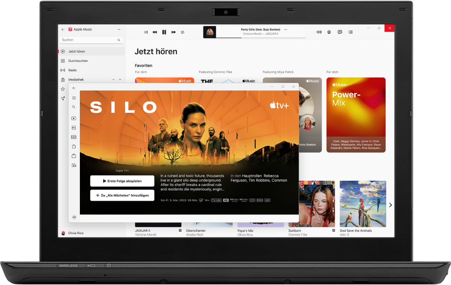 Ein PC mit den geöffneten Apps „Apple TV App“ und „Apple Music“