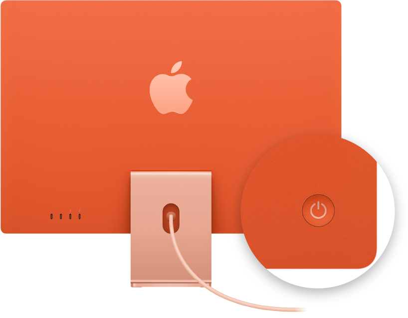 Vista posterior d’un iMac de 24 polzades en què es destaca el botó d’engegada.
