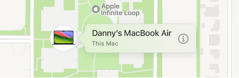 Bližnji prikaz ikone informacij za Danijev MacBook Air.