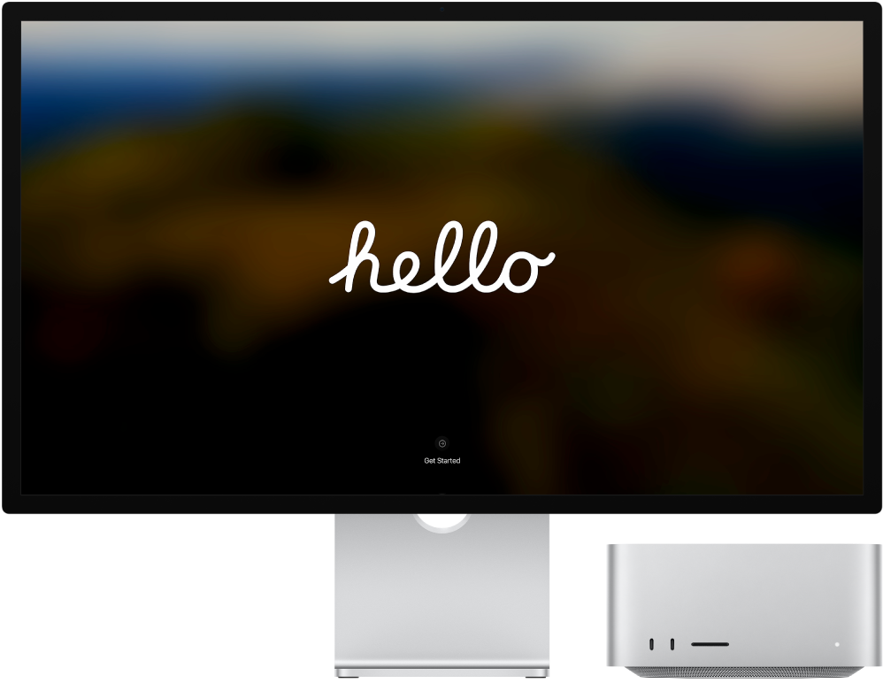 Ein Studio Display und ein Mac Studio nebeneinander; das Wort „Hallo“ ist auf dem Bildschirm zu sehen.
