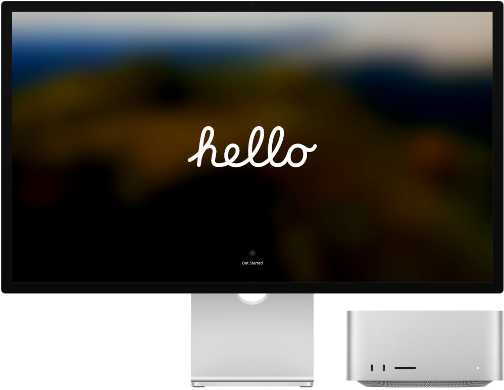 A Studio Display and a Mac Studio side by side with the word “hello” on the screen.