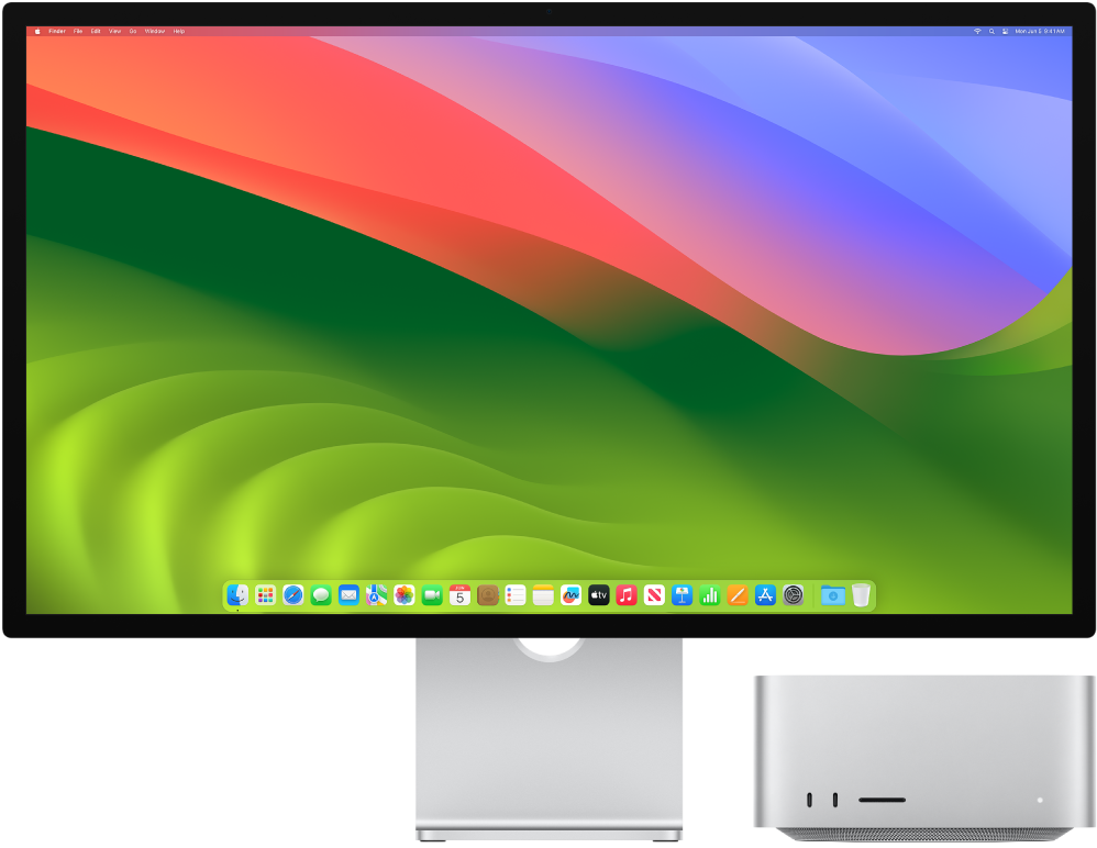 Una pantalla Studio Display al costat d’un Mac Studio.