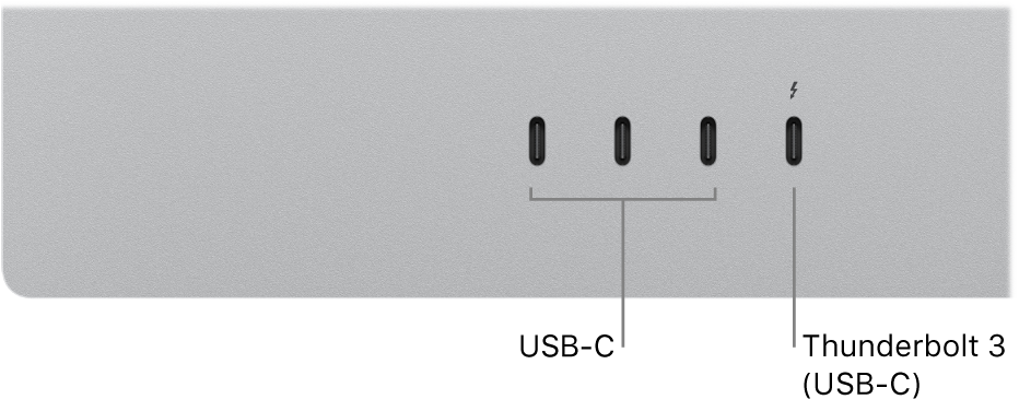 A close-up of the back of Studio Display showing three USB-C ports on the left and a Thunderbolt 3 (USB-C) port to their right.