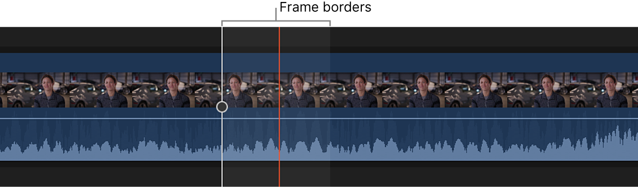 A clip in the timeline zoomed in to show the audio waveform within the borders of a video frame