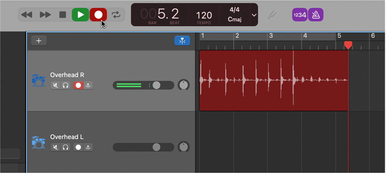 Showing a recorded audio region in red in the Tracks area.