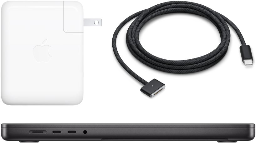 Side view of 16-inch MacBook Pro with accompanying accessories.