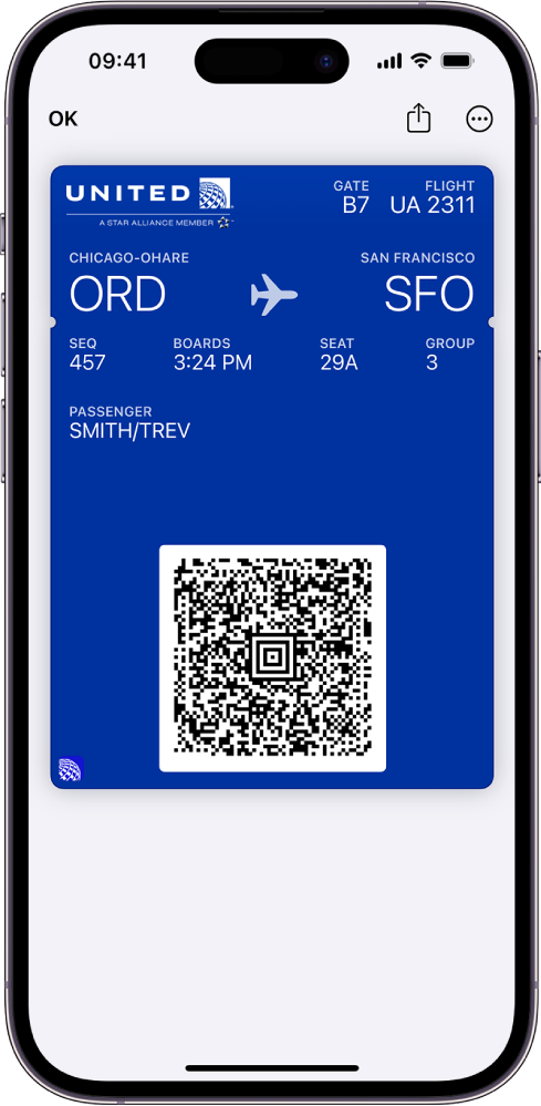 Une carte d’embarquement dans l’app Cartes, affichant des informations de vol et le code QR en bas.