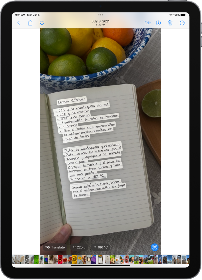 A photo open in full screen. Within the photo, handwritten text is highlighted. At the bottom of the screen are buttons for translate and conversions. The Live Text button in the bottom-right corner of the screen is selected.