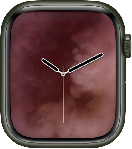 The Vapor watch face showing an analog clock in the middle and vapor around it.