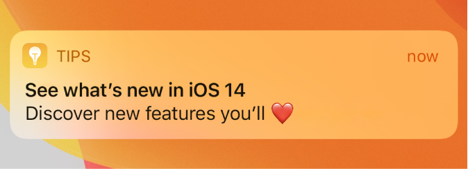 A Tips notification that says “Discover new features you’ll [heart]” with no punctuation at the end.