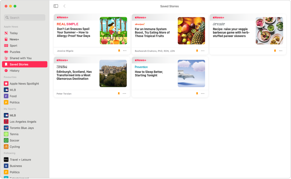 The Apple News window showing Saved Stories selected in the sidebar and five saved stories arranged in a grid on the right.
