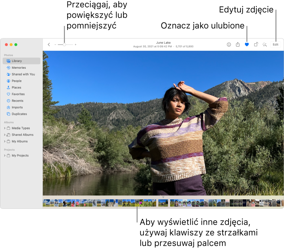 Zdjęcie okna aplikacji Zdjęcia z powiększonym zdjęciem po prawej i rzędem miniaturek na dole. Na pasku narzędzie na górze znajduje się suwak zoom, przycisk ulubionych oraz przycisk Edycja.