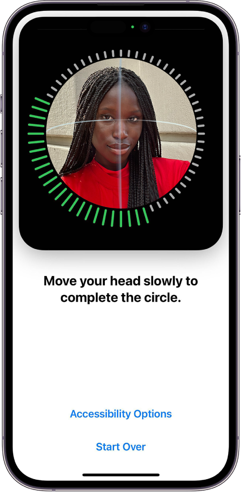The Face ID recognition setup screen. A face is showing on the screen, enclosed in a circle. Text below that instructs the user to move their head slowly to complete the circle. A button for Accessibility Options appears near the bottom of the screen, along with a Start Over button.