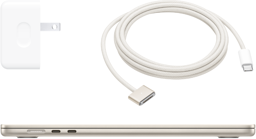 MacBook Air – поглед отстрани заедно с доставените аксесоари.