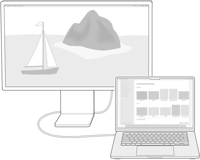 „MacBook Air“ šalia „Studio Display“, kuris naudojamas kaip išorinis monitorius.