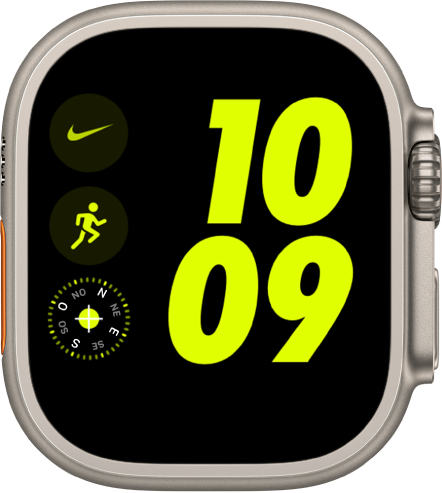 L’esfera Nike digital. L’hora es mostra en números grossos a la dreta. A l’esquerra, la complicació de l’app Nike és a la part superior, la complicació Entrenament, al centre i la complicació Brúixola a la part inferior.